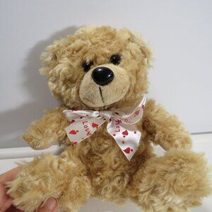tan teddy bear with curly fur very soft very squishable 8" tall